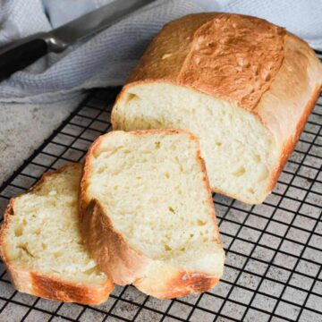 Soft sourdough sandwich bread with milk, freshly baked and sliced.