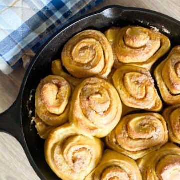 Just baked sourdough pumpkin cinnamon rolls in a cast iron skillet.