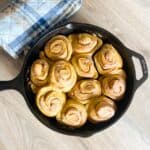 Just baked sourdough pumpkin cinnamon rolls in a cast iron skillet.