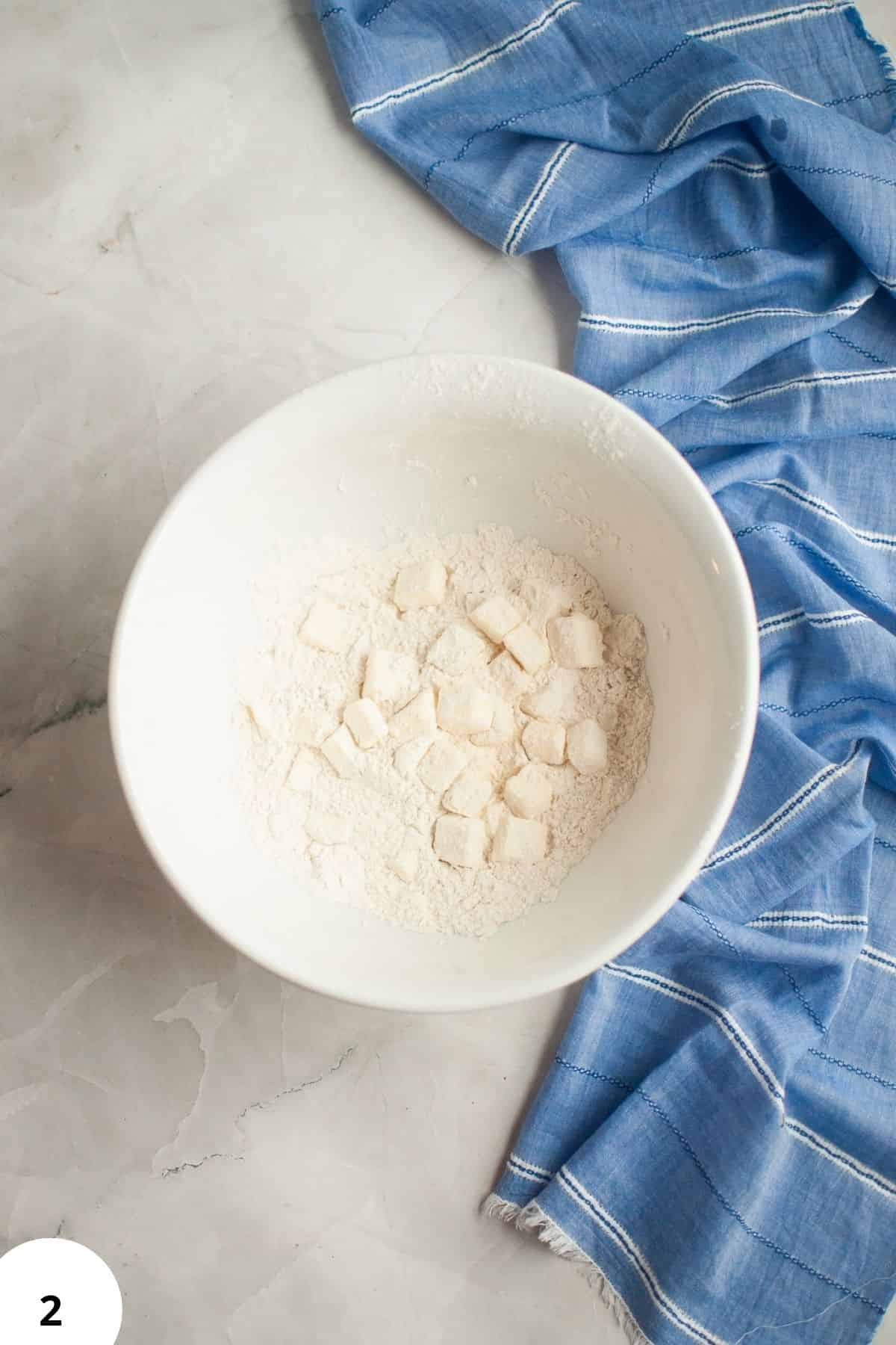 Sourdough dough undergoing stretch and fold technique for bread baking.