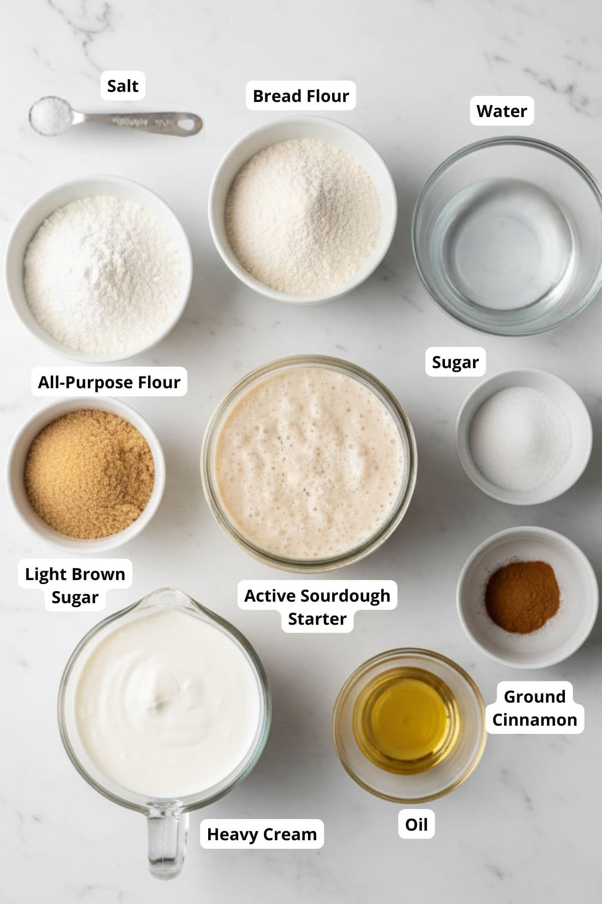 Ingredients for sourdough cinnamon brown sugar bread with better swirls neatly arranged on a surface.