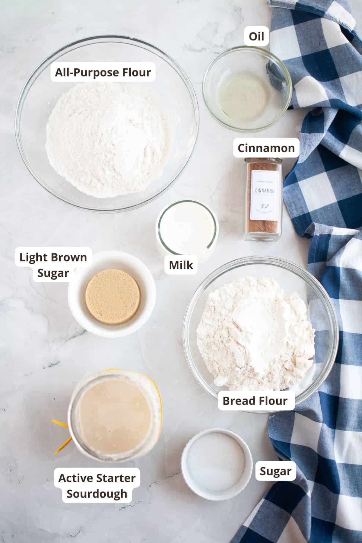 Baking ingredients including eggs, flour, sugar, vanilla pudding powder, raspberries, sour cream, se.