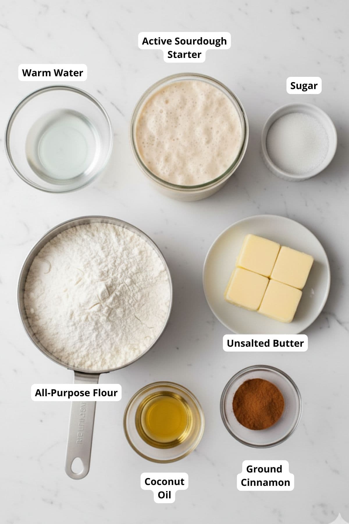Ingredients for a sourdough apple recipe arranged on a surface.
