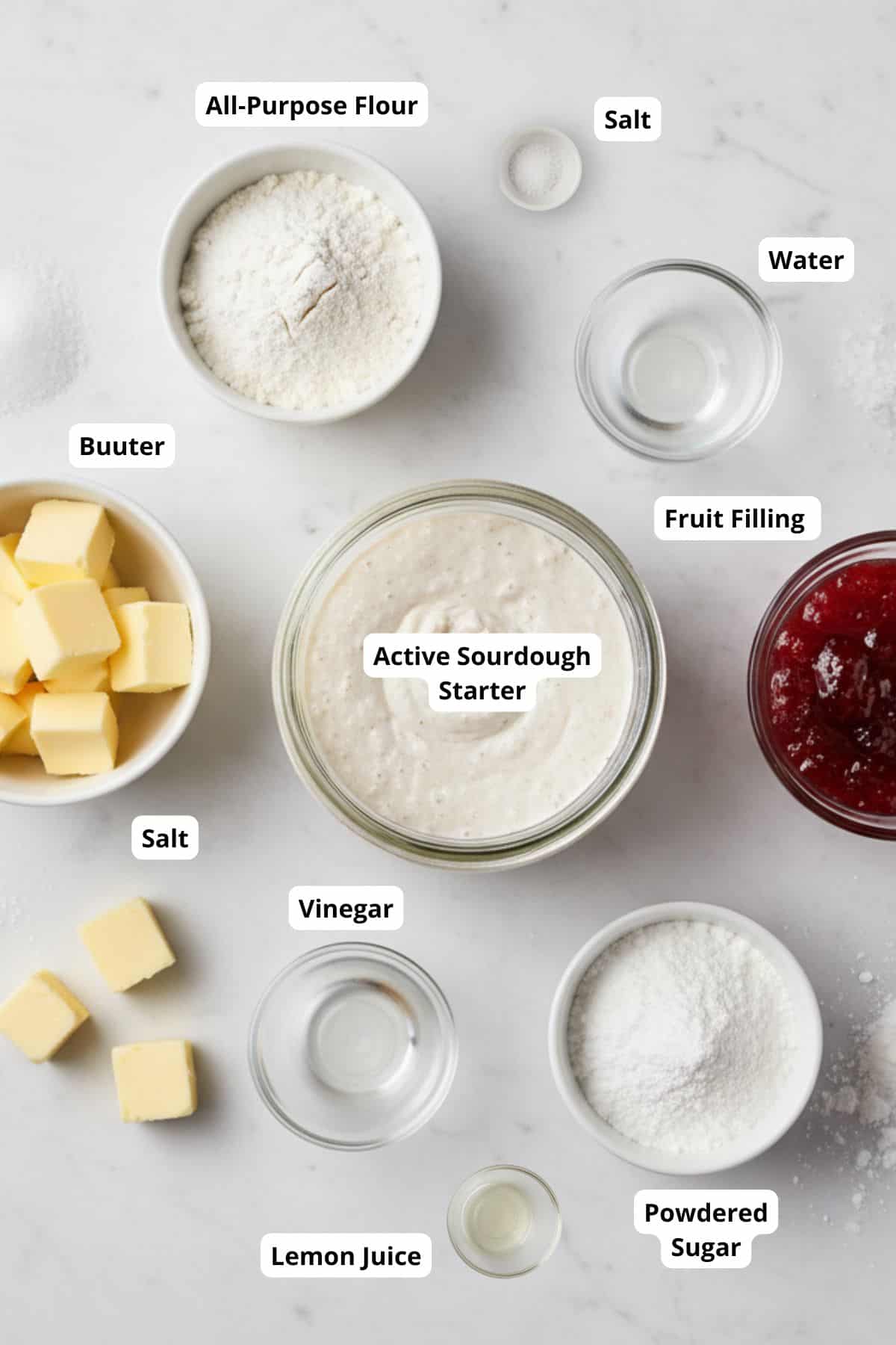 Ingredients for sourdough discard pop tarts arranged on a surface.