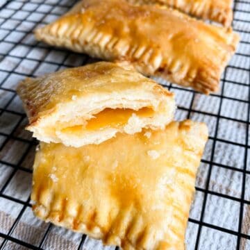 A sourdough discard pop tart on a black cooling rack.