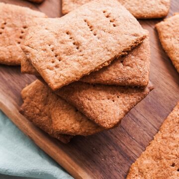 Sourdough graham crackers on a wooden board.