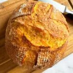 Fluffy sourdough bread with a golden crust, perfect for baking and bread-making enthusiasts.