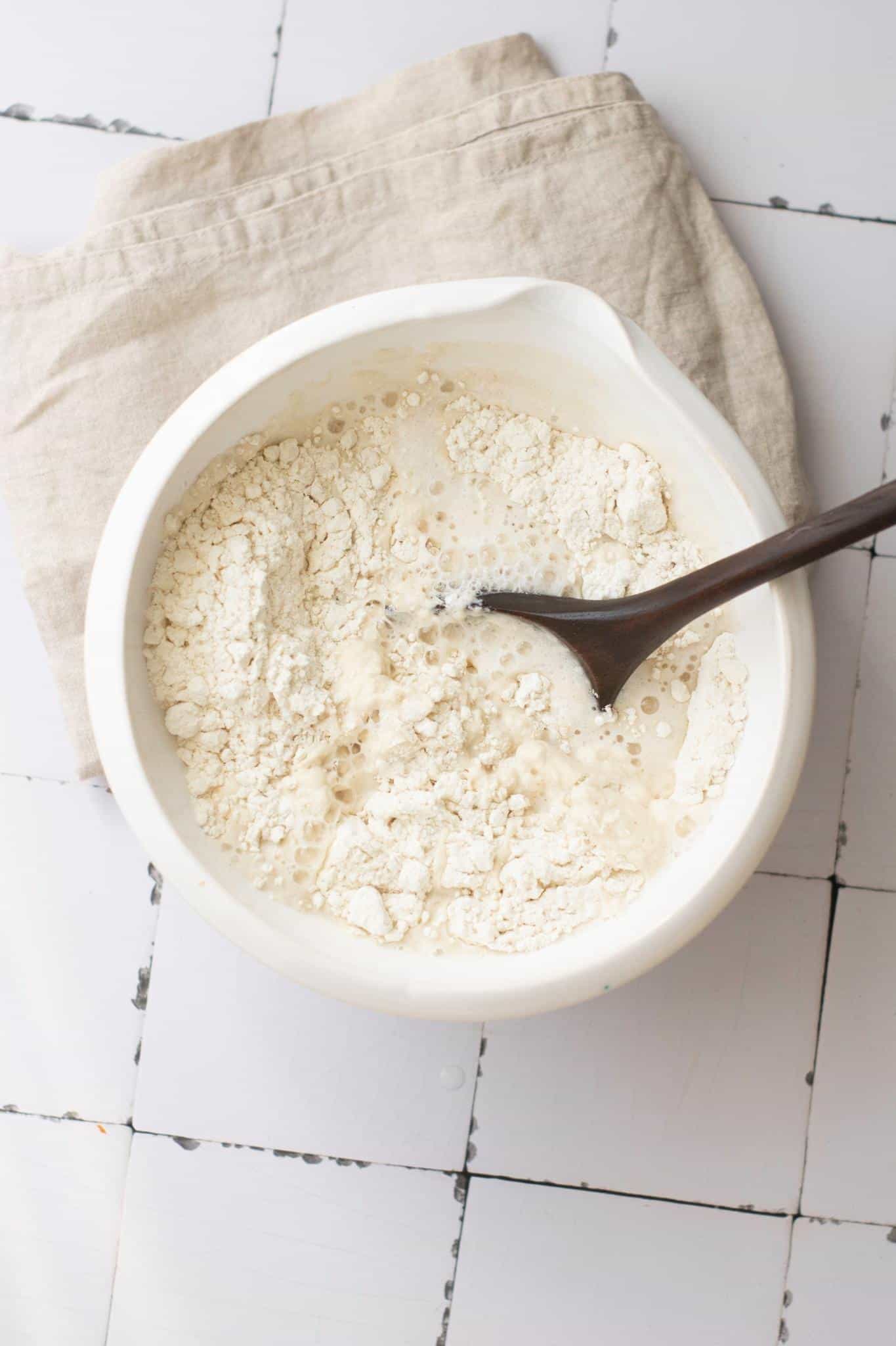 Ingredients of French Baguette in a small bowl with spoon.