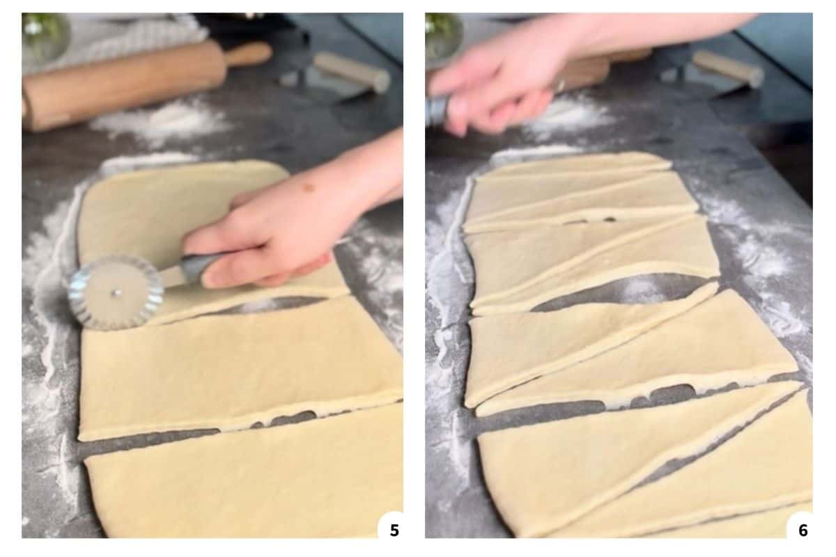 A hand using a pizza cutter to slice dough on a floured surface.