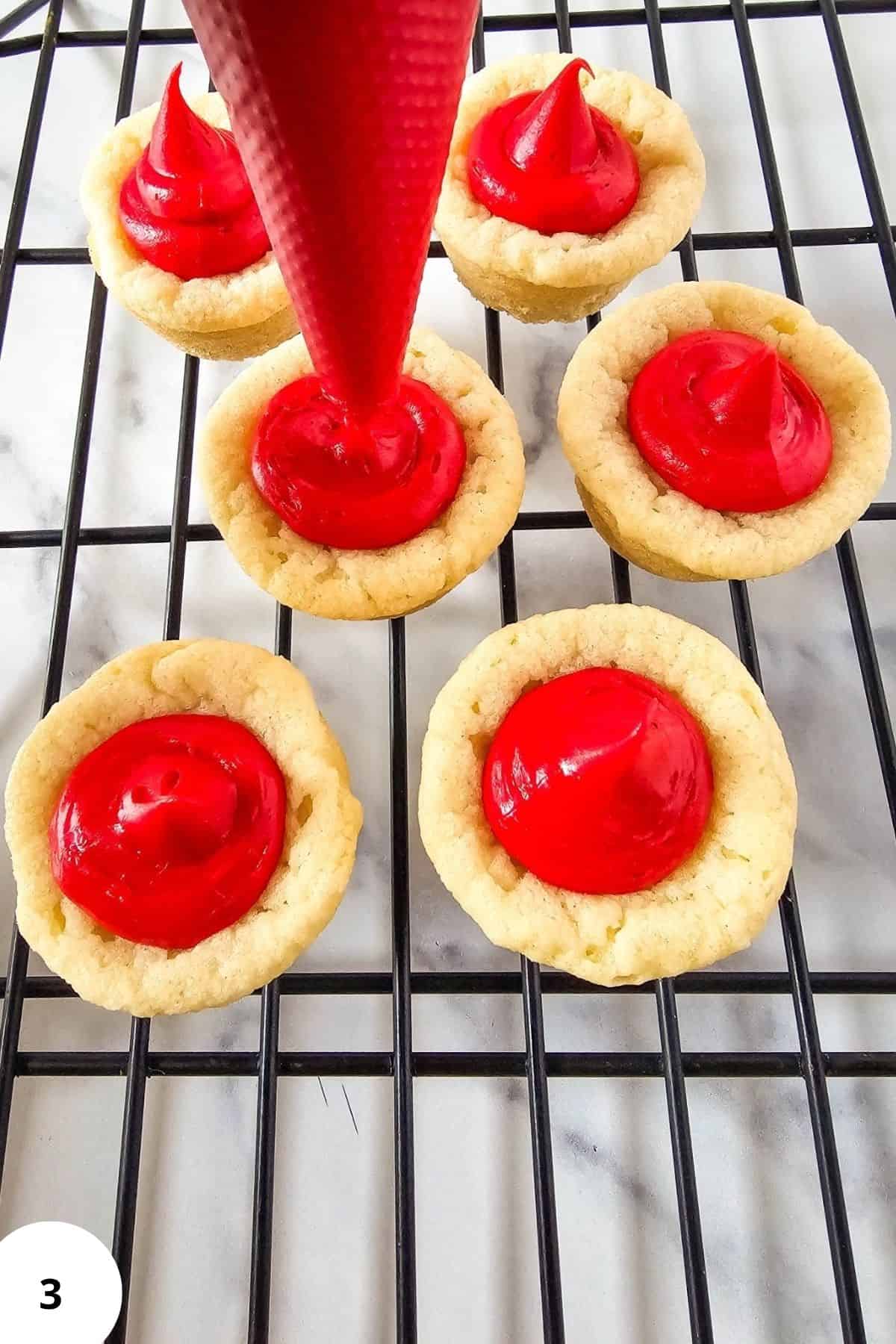 Melted chocolate being poured into the center of cookie dough.