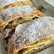 Close-up of strudel slices served on a plate.