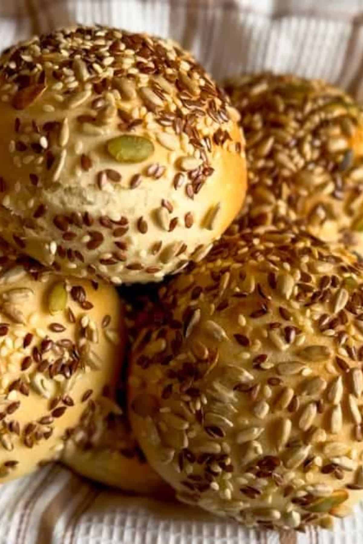 Close-up of golden yeasted bread rolls showing their soft texture.