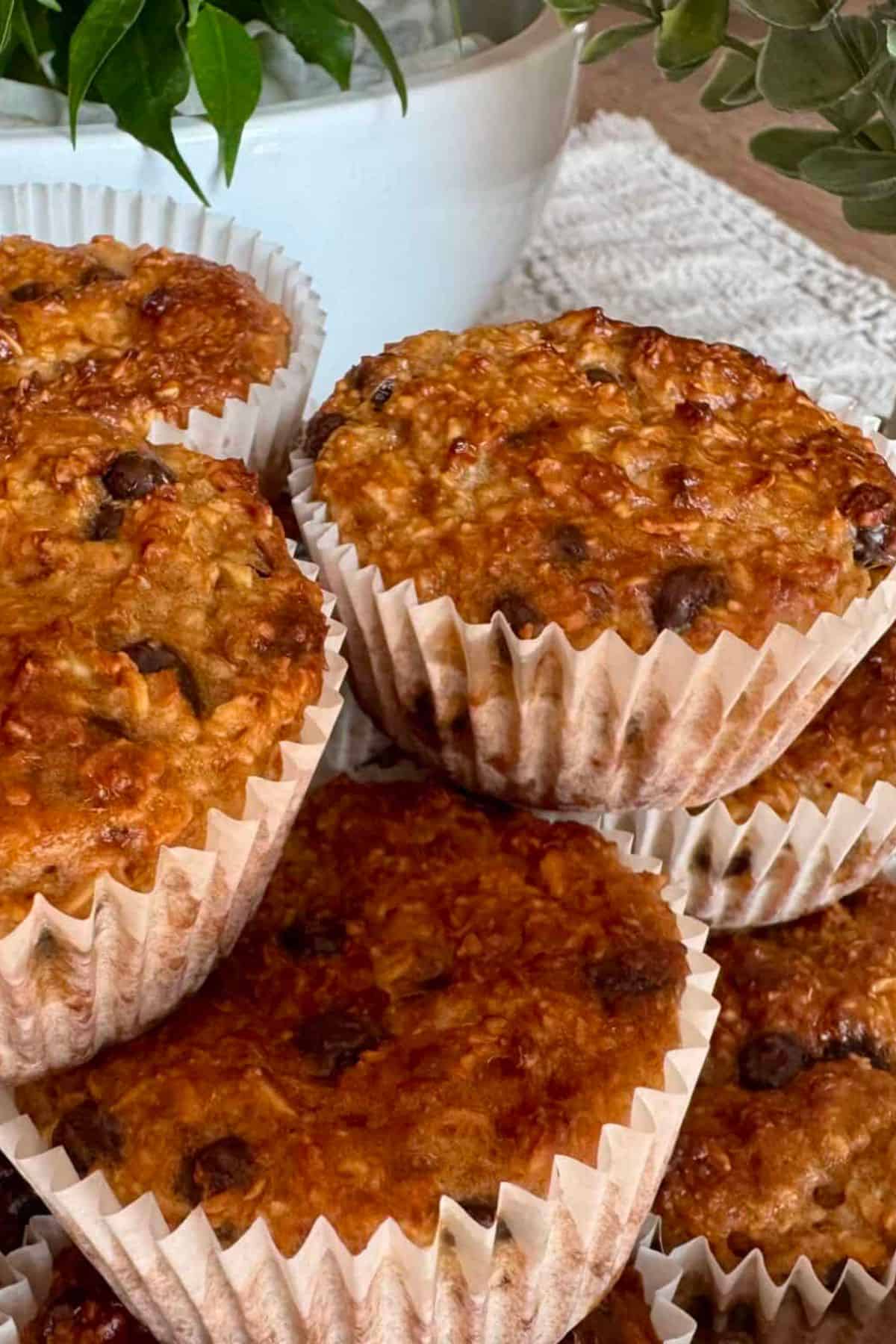 Close-up of protein muffins with Greek yogurt stacked on a plate, ready to be served.