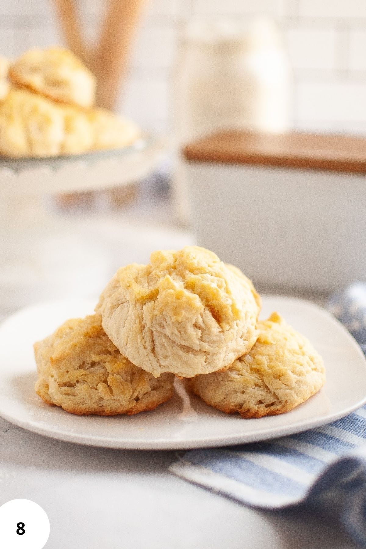Freshly baked muffins served on a plate.