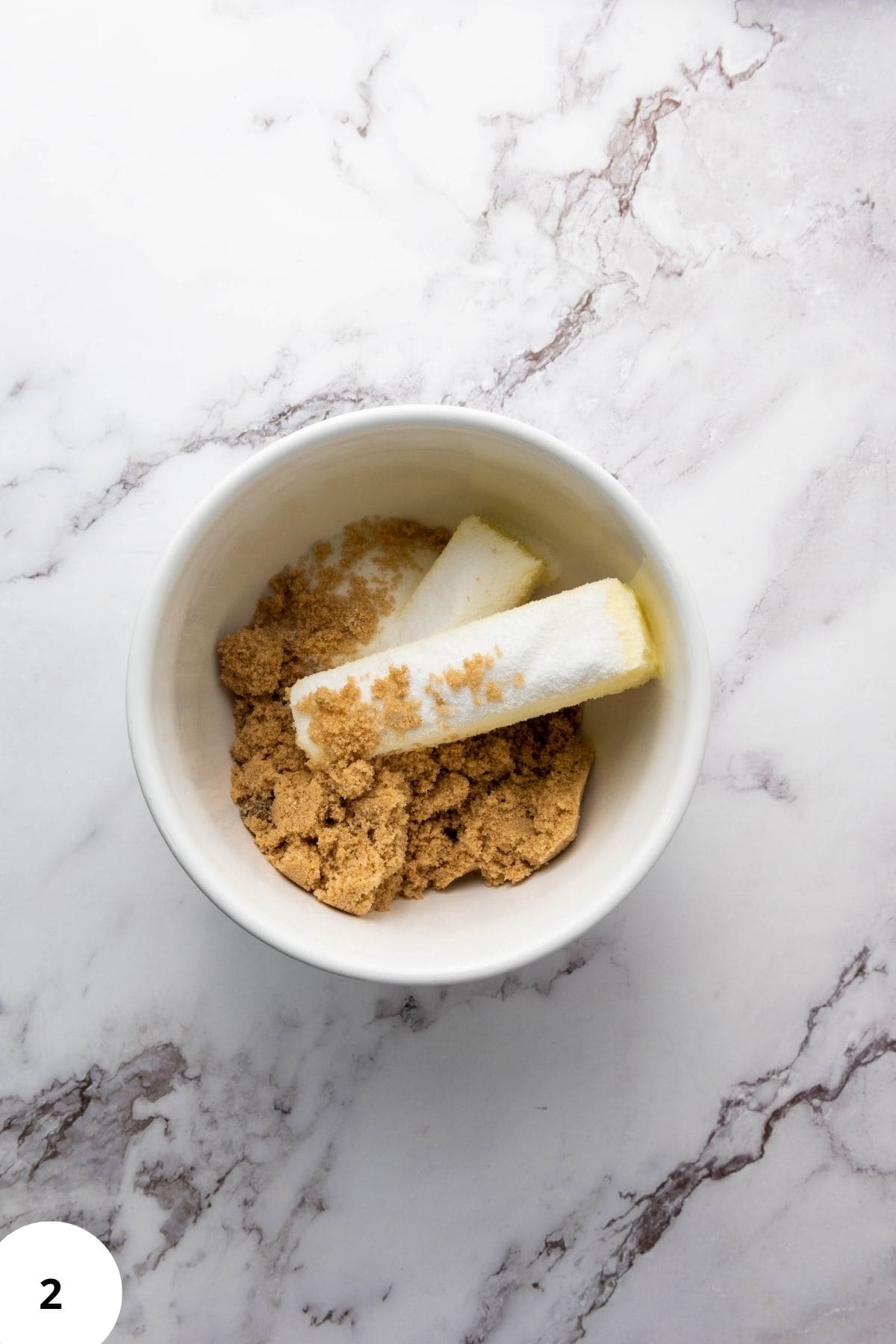 Cookie ingredients being mixed in a bowl.