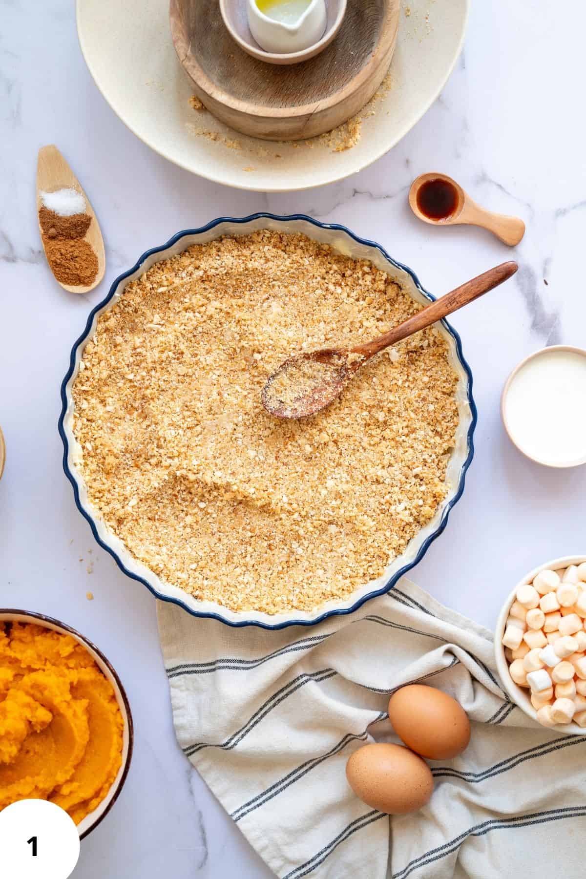 Pie with the crust on top cooking in a pie maker.