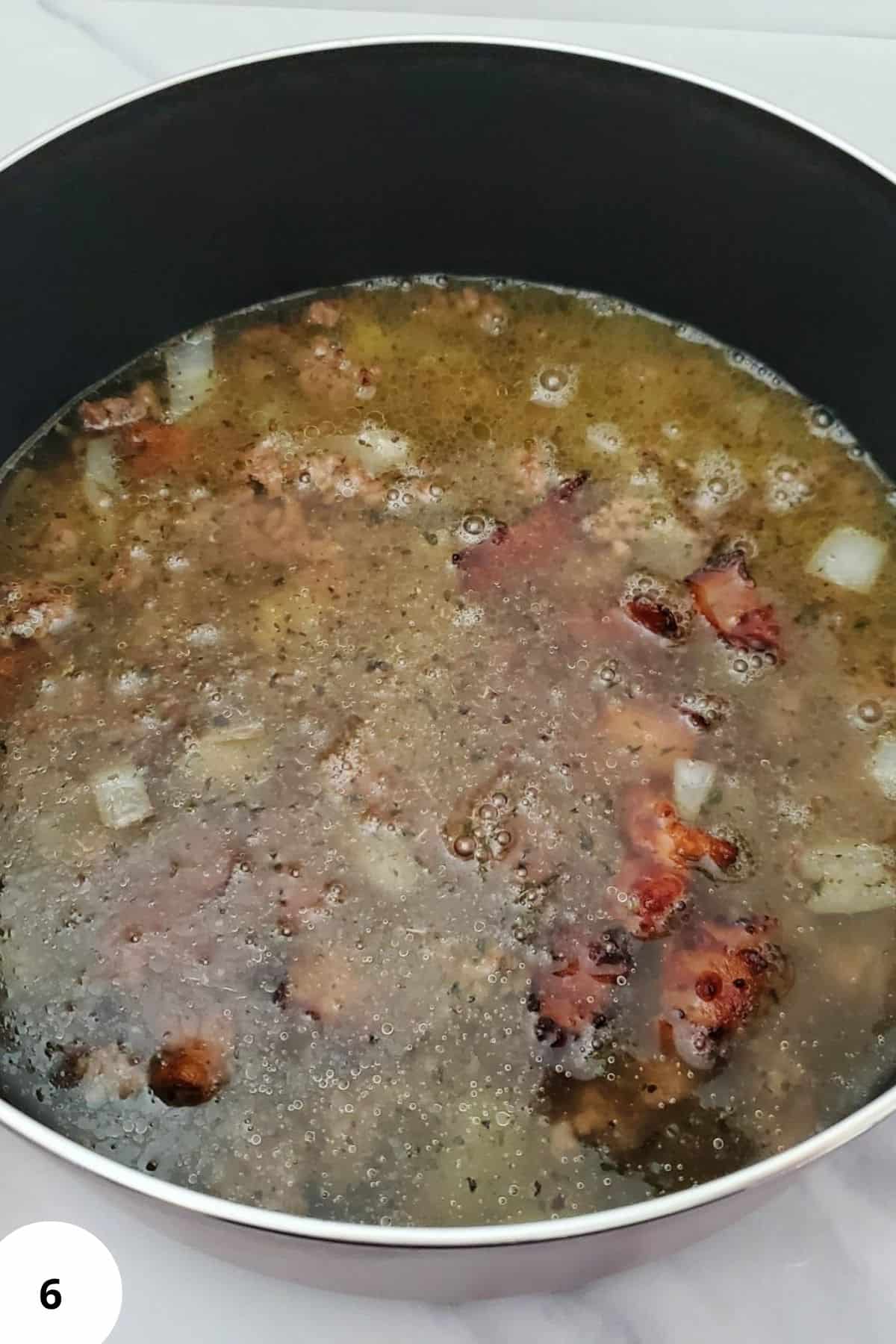 Ingredients soaking in a pot.