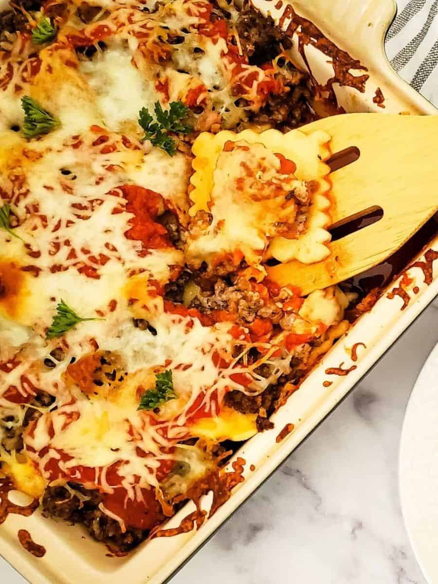 Easy homemade lasagna with savory meat sauce, cheese, and fresh herbs.