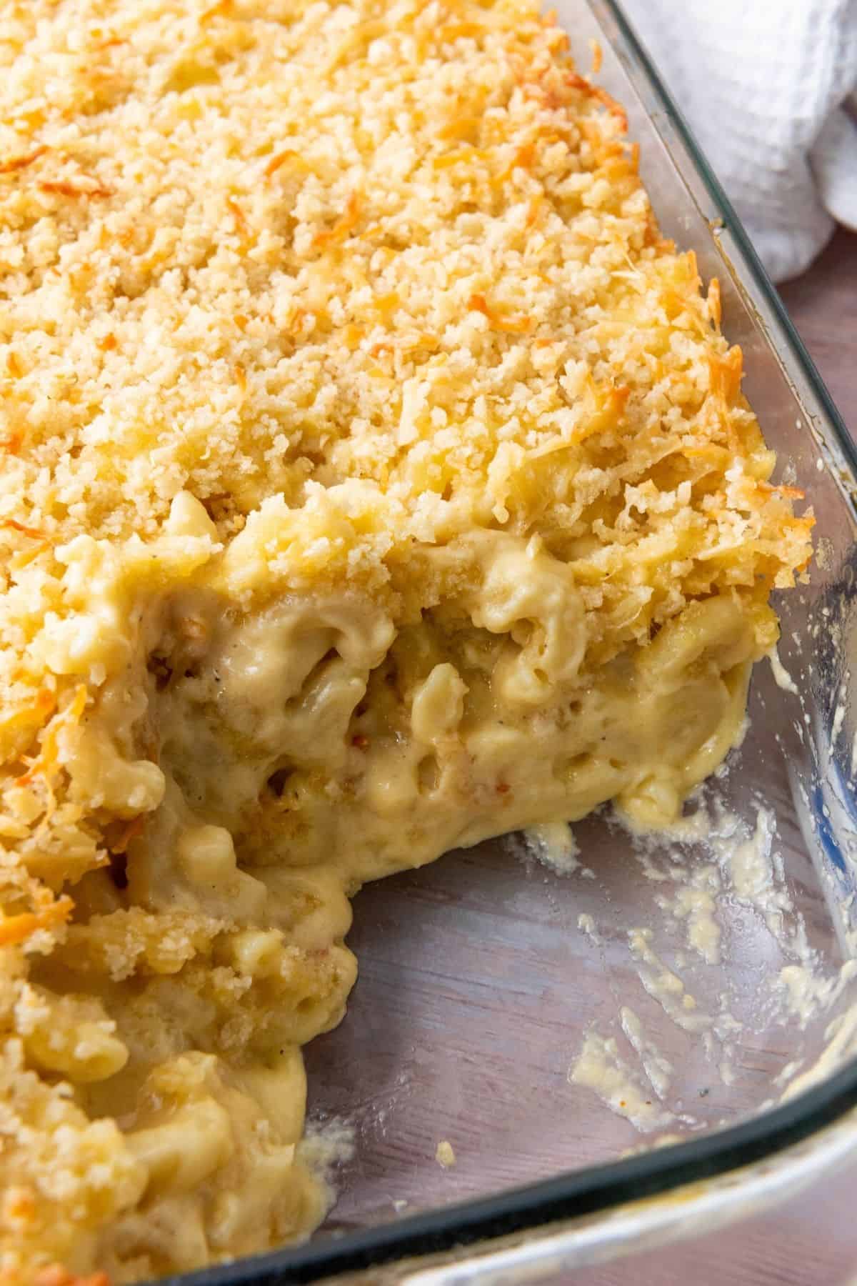 Delicious baked casserole with gooey cheese and crispy breadcrumb topping, perfect for family dinners.