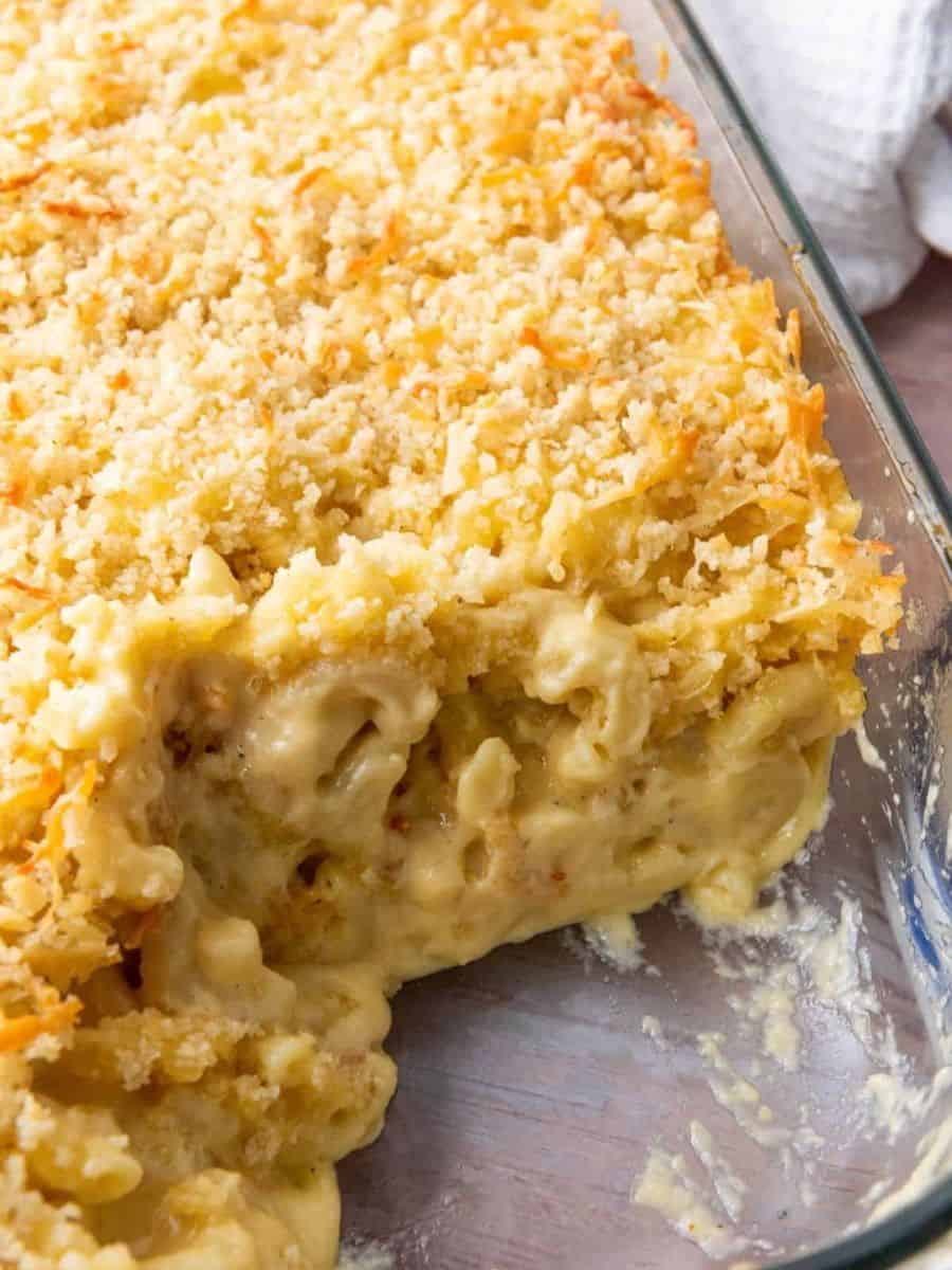 Oven-baked cheesy potato casserole with crispy topping and creamy interior, perfect for comfort food lovers.