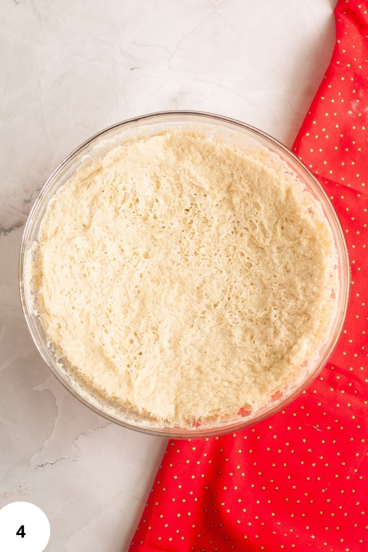 Soft sourdough bread dough ready for shaping and folding.