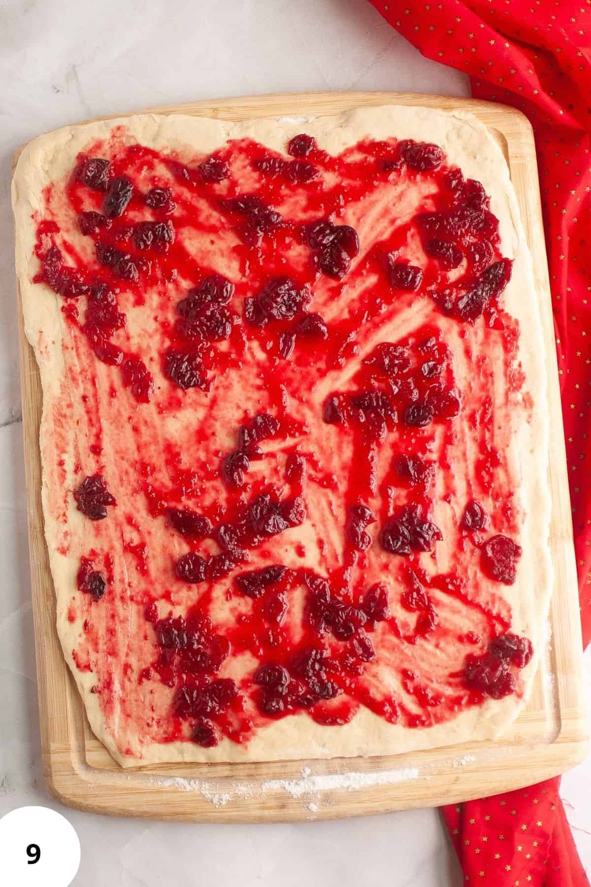 Cranberry mixture spread over flattened dough.