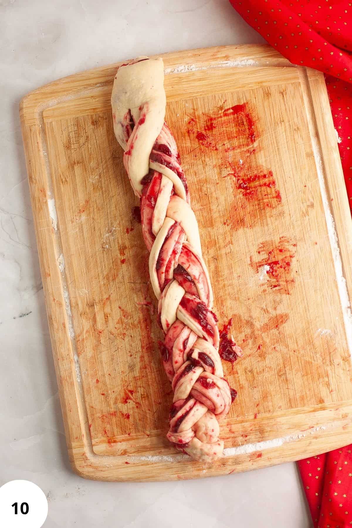 Rolled sourdough on a wooden board.