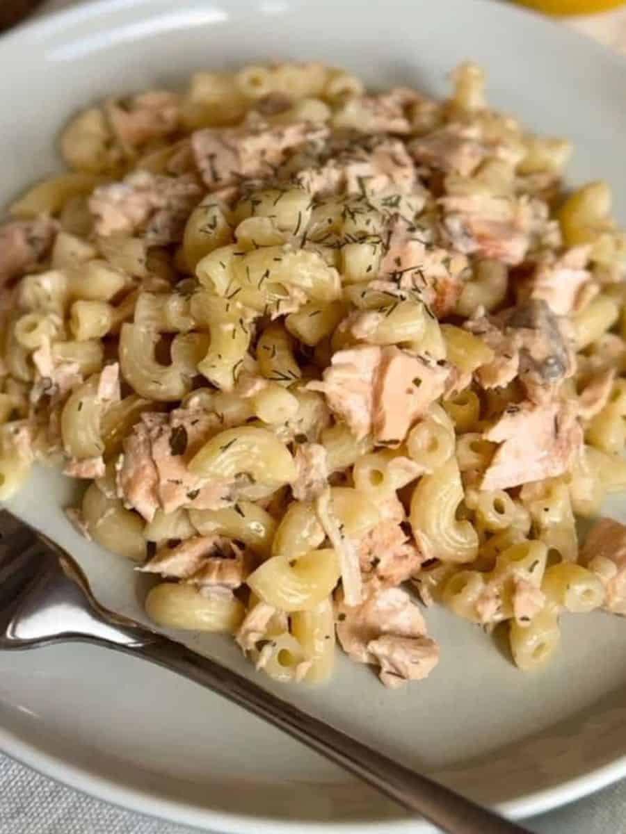 Delicious tuna pasta prepared with herbs and creamy sauce, perfect for quick, easy meals.