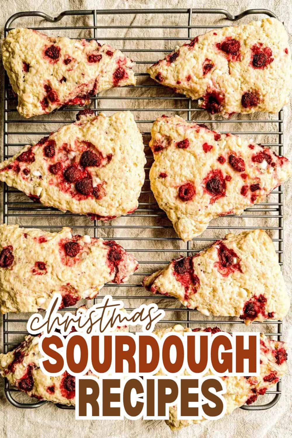 Fresh cranberry sourdough bread slices on a cooling rack for Christmas.