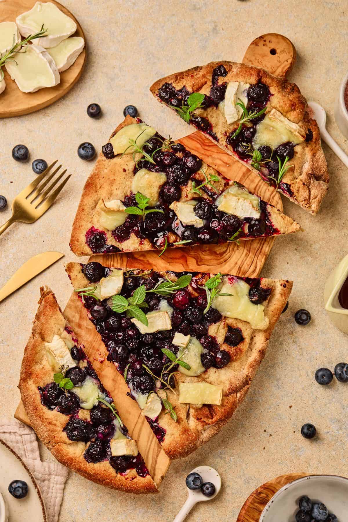 Delicious blueberry and blackberry pie with flaky crust, fresh berries, and melt-in-your-mouth cheese. Perfect for dessert or snack.