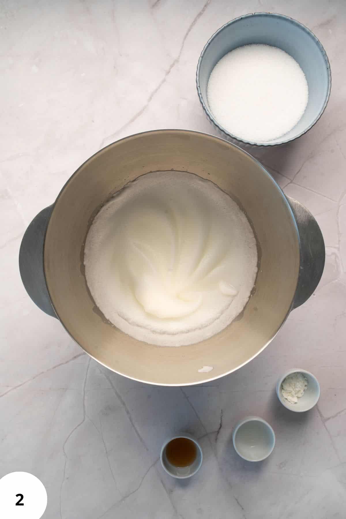Artisan bread dough being shaped through stretch and fold technique.