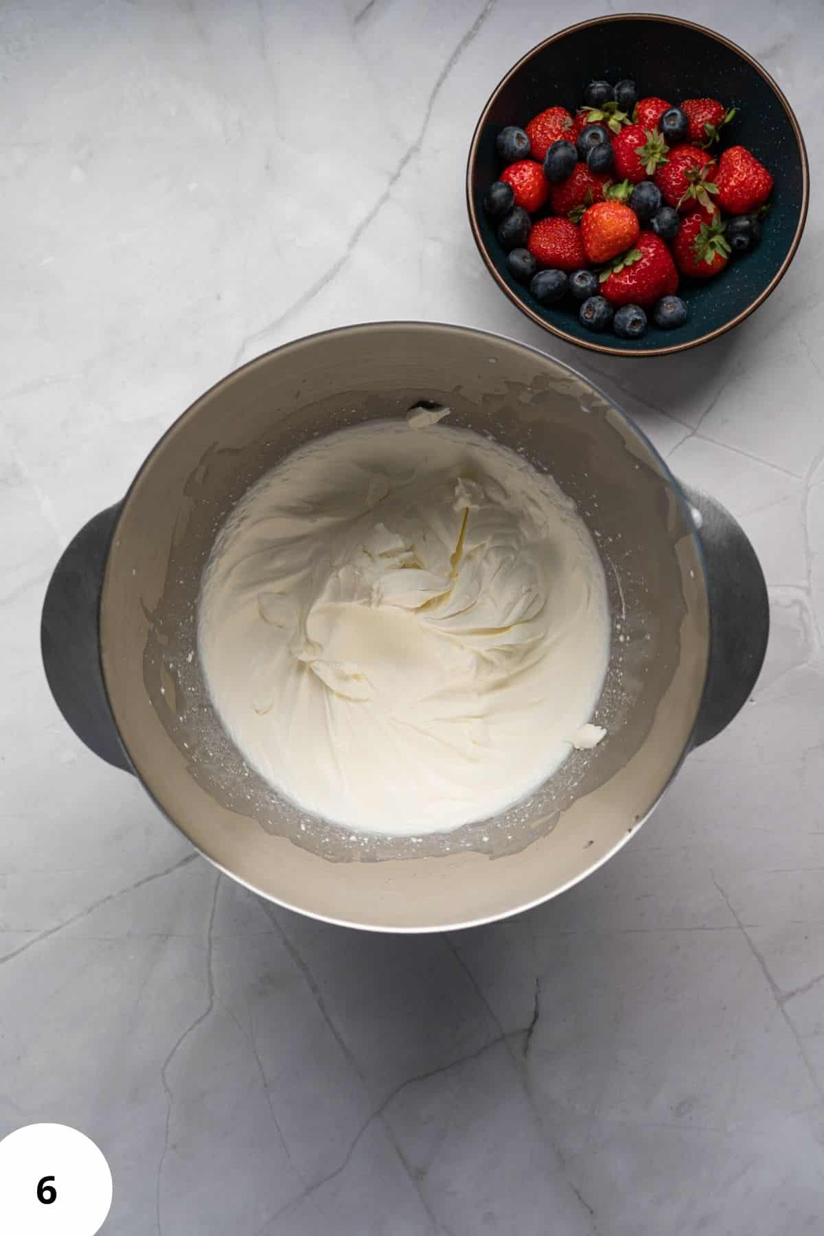 Cream cheese frosting in mixing bowl.