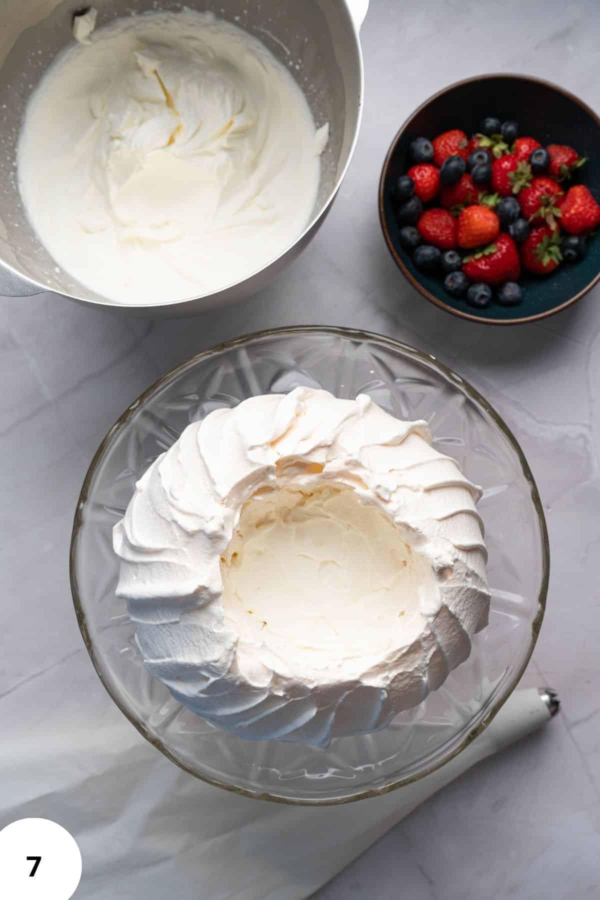 Cream cheese frosting, in a cake stand.