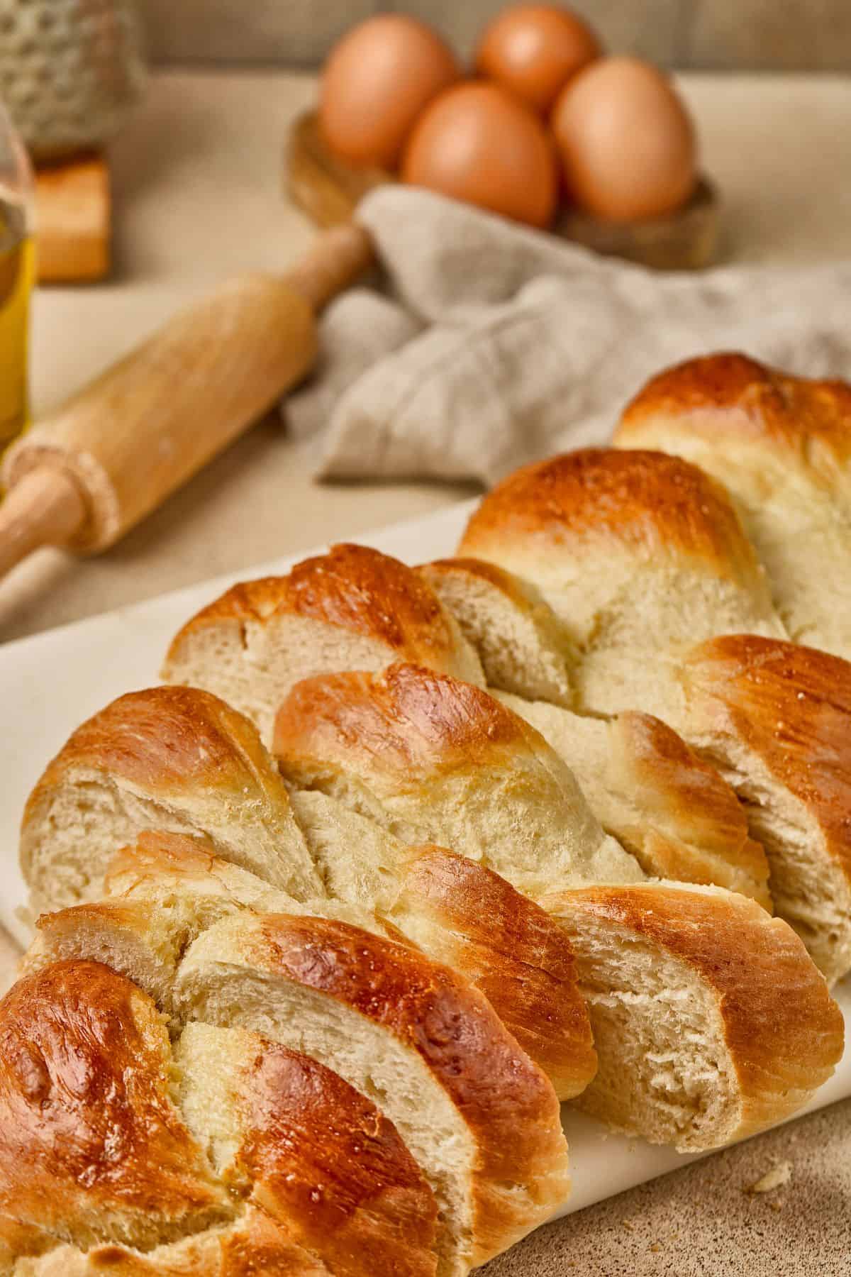 Soft, risen bread dough with shiny crust, showing proper gluten development through stretch and folds.
