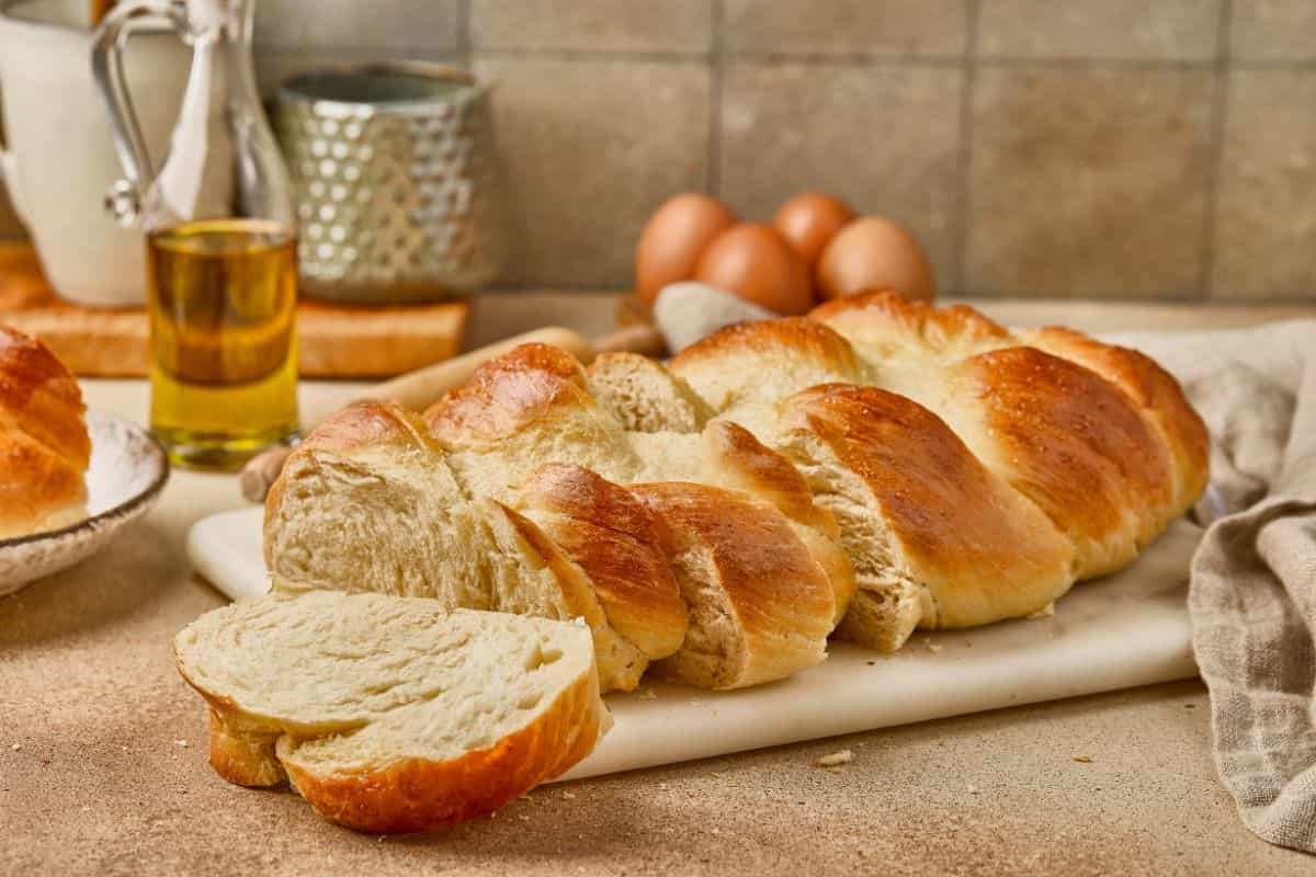Soft, airy bread loaf with golden crust, showcasing the benefits of stretch and fold method. Great for home bakers focusing on dough development.