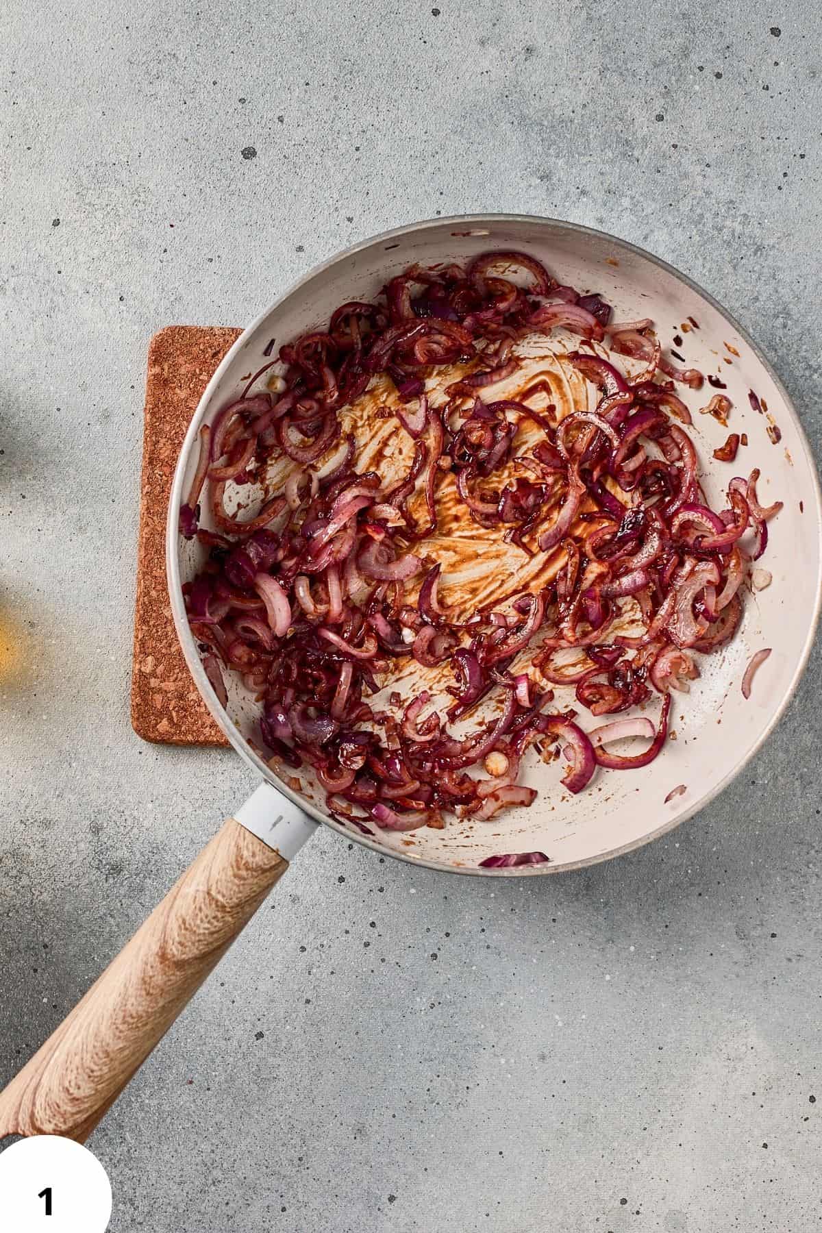 Sourdough with caramelized onions in a skillet, perfect for baking or cooking bread recipes.