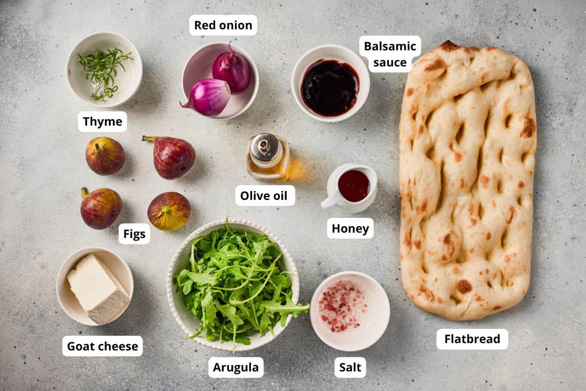 Fresh focaccia bread with toppings and ingredients for homemade bread baking.