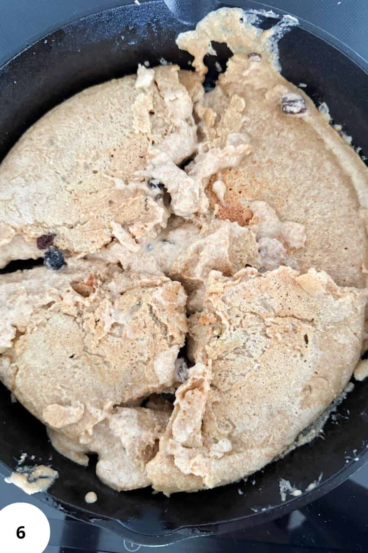 Close-up of freshly cooked Austrian shredded pancake in a skillet.