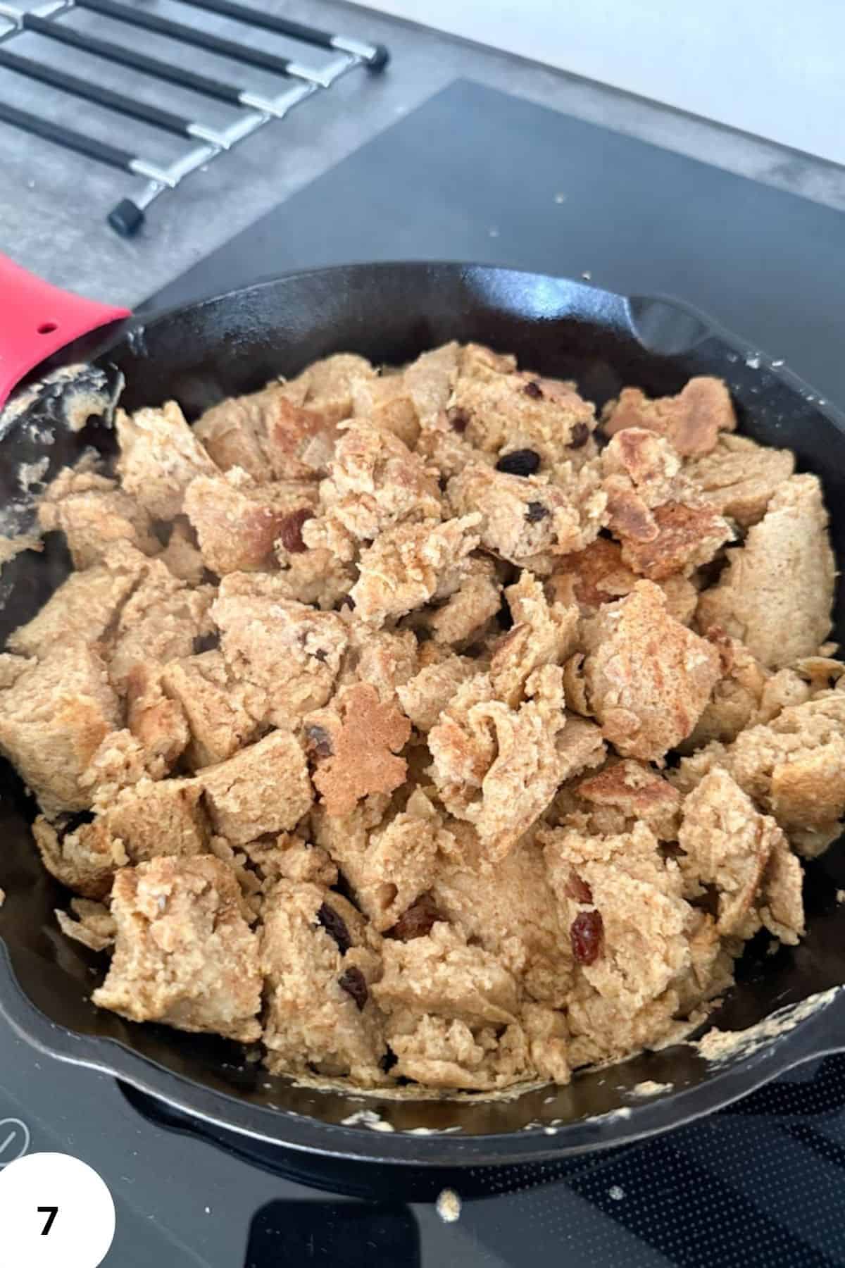 A skillet of freshly cooked Austrian shredded pancake, golden and crispy, ready to serve.