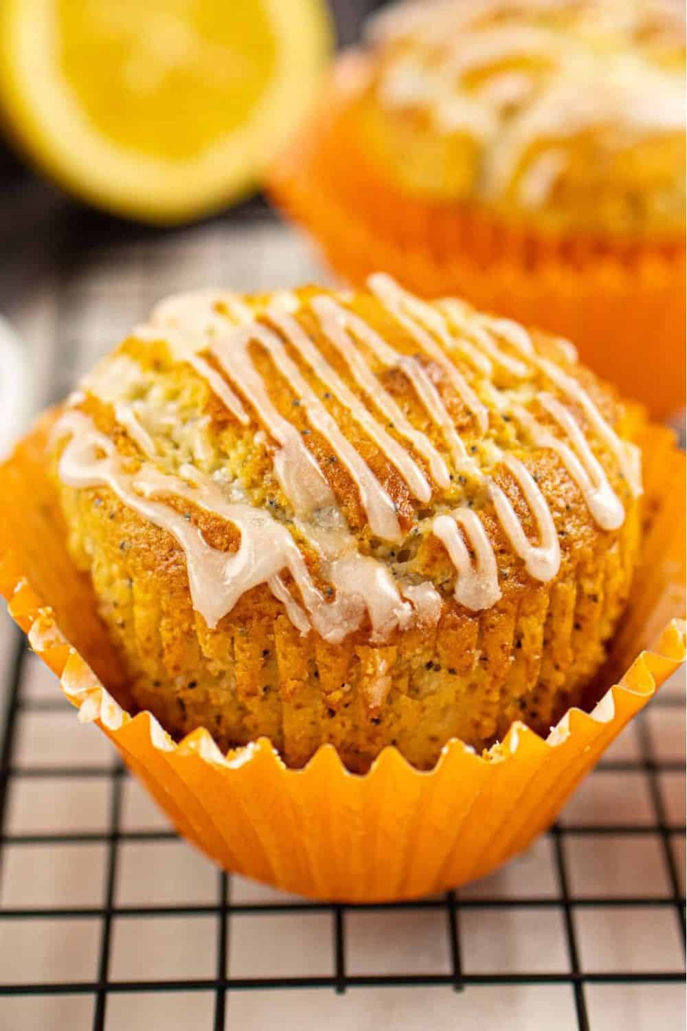 Delicious orange muffin with glaze, perfect for breakfast or snack. Baked fresh with citrus flavor.