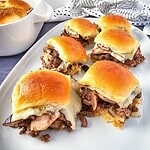 Close-up images of juicy beef, mushrooms, melted cheese with golden buns, perfect for sandwich recipes.