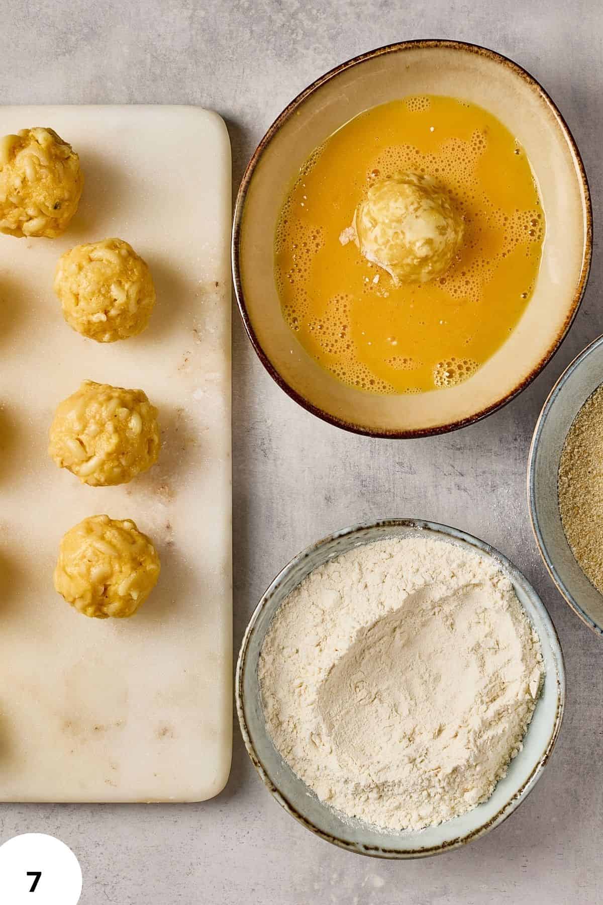 High-quality ingredients for bread making, including flour, eggs, and dough balls.