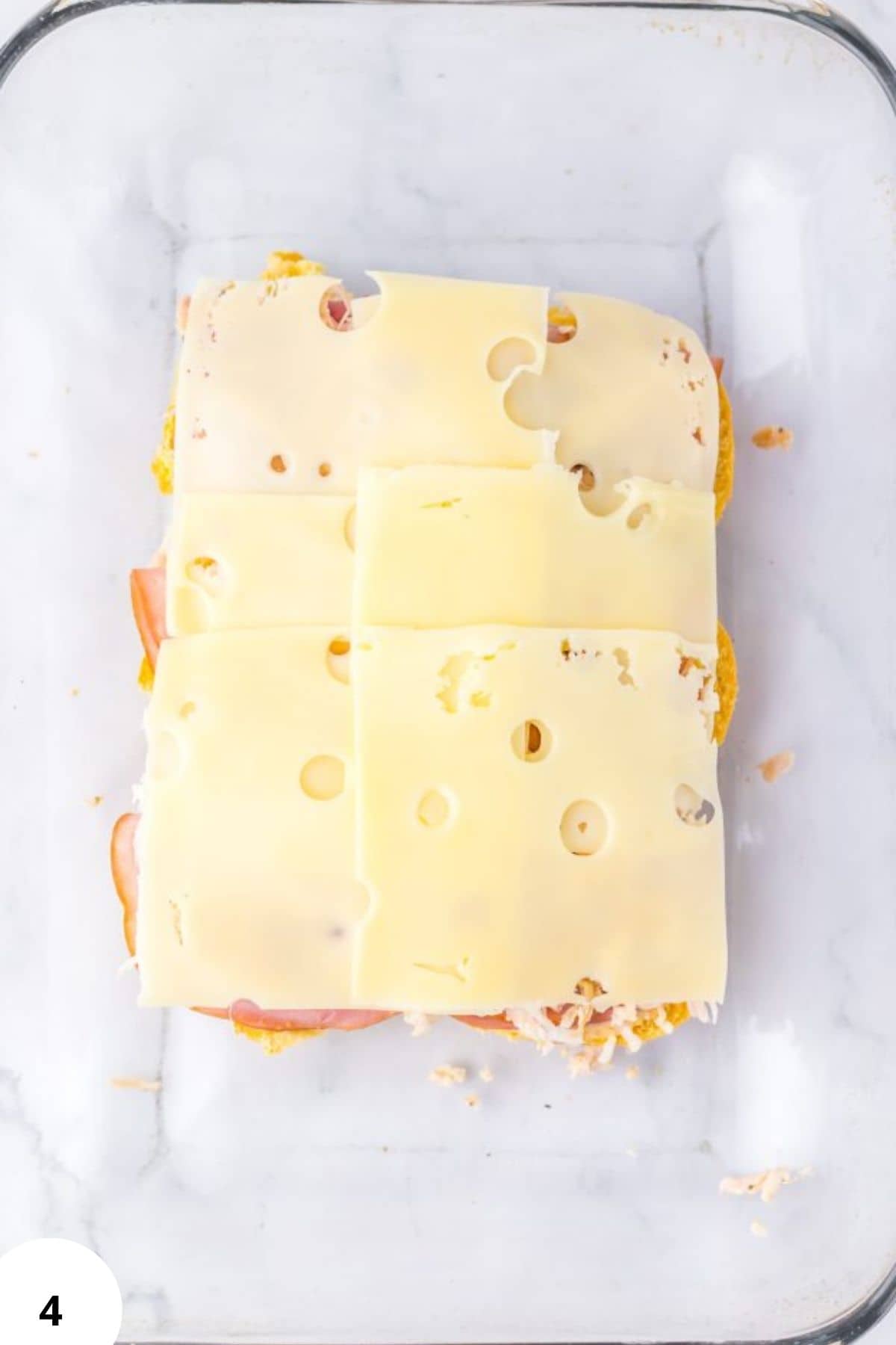 Freshly layered bread dough with cheese and ham, showcasing proper Stretch and Folds techniques for perfect bread texture.