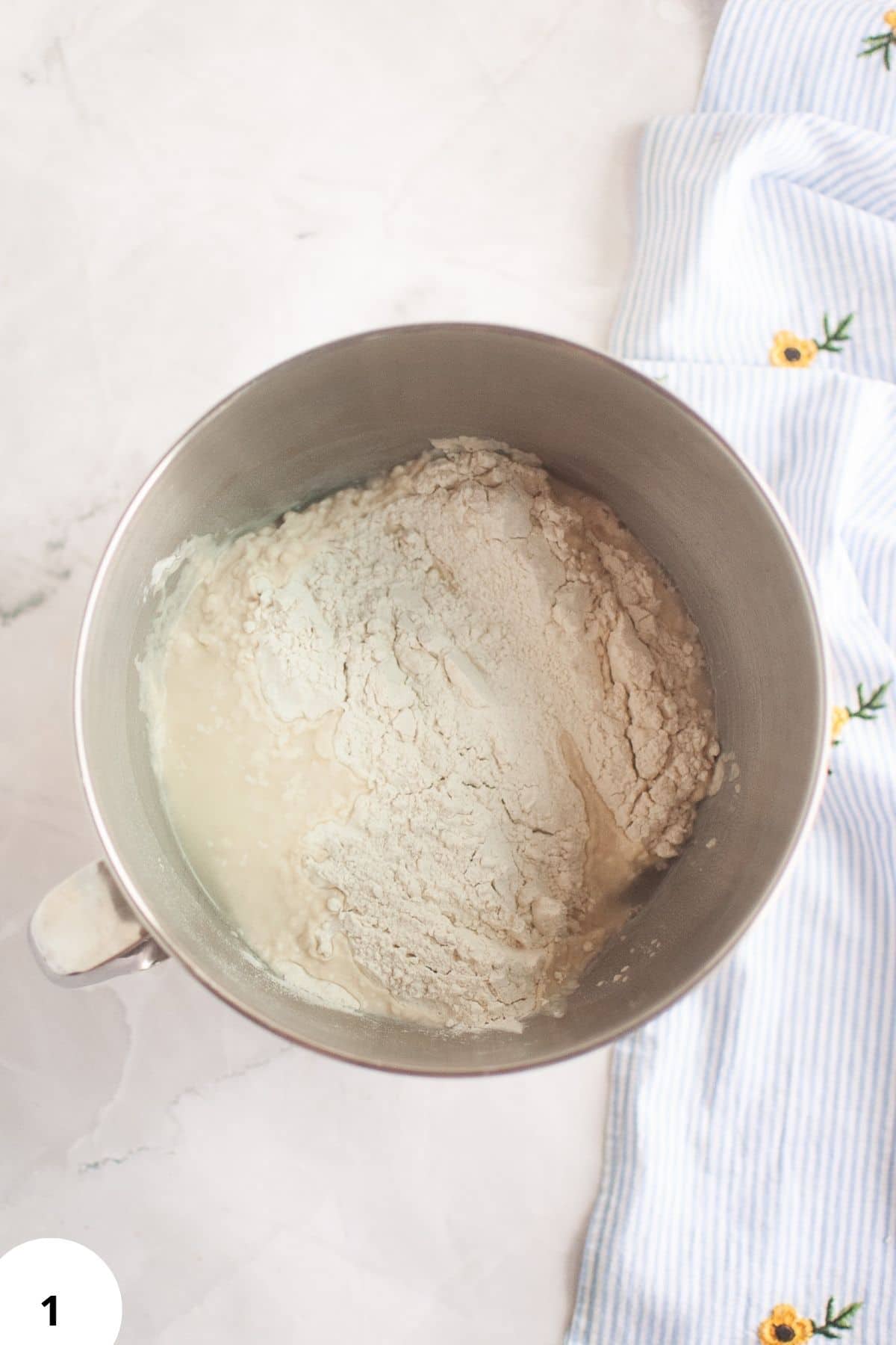 Dough preparation for artisan bread, focusing on stretch and fold method.