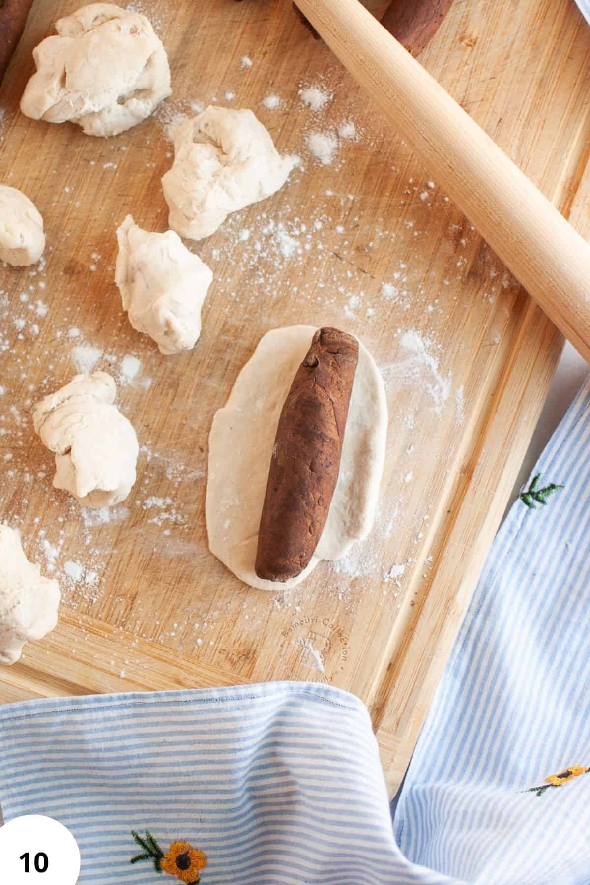 Dough stretching and folding method for artisan bread baking.