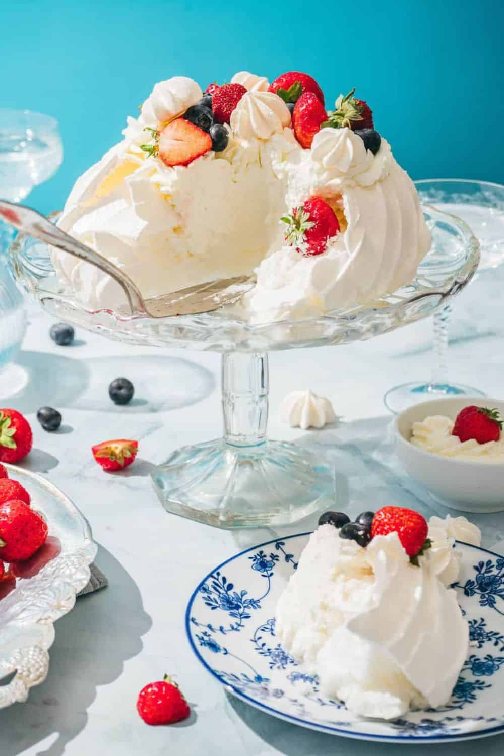 Delicious sensory experience of bread with fresh strawberries, blueberries, and whipped cream.