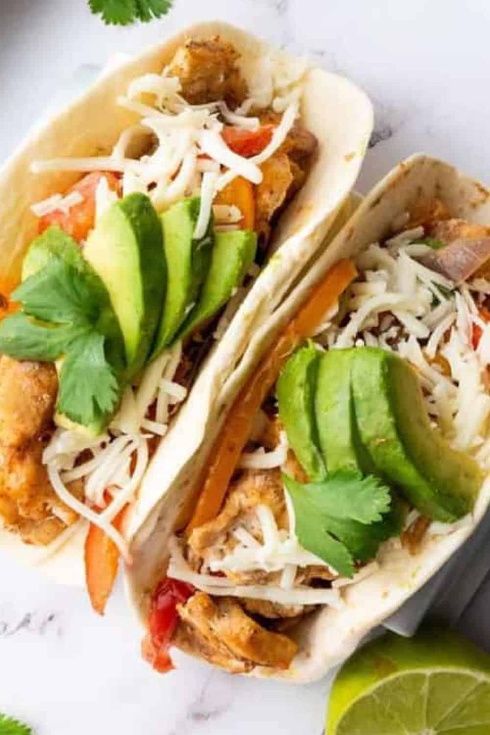 Delicious tacos filled with fresh ingredients and cheese, perfect for a quick and flavorful meal.