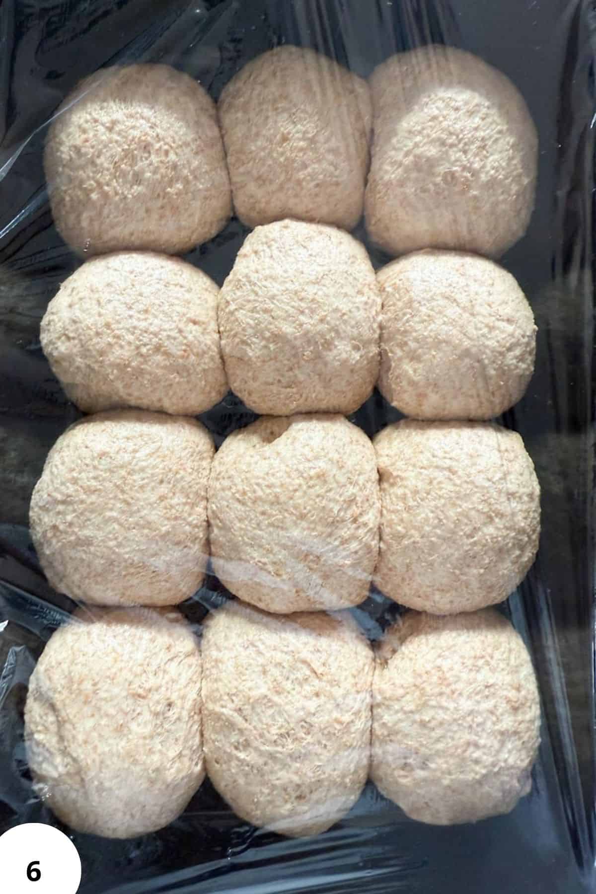 Delicious homemade bread rolls made from freshly milled flour, perfect for baking or snacking.