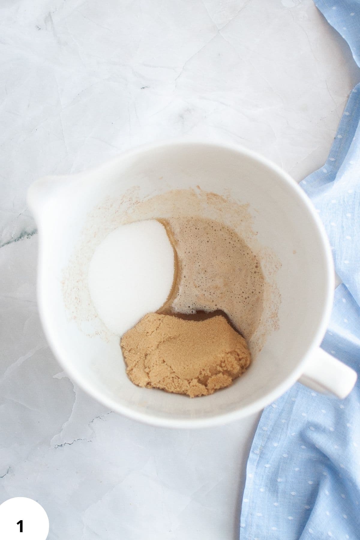 Mixing flour, water, yeast, salt, and other ingredients for bread dough.