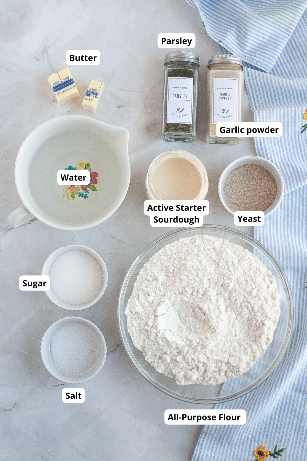 Alt: Bread dough ingredients including flour, yeast, water, and seasonings for stretch and folds.